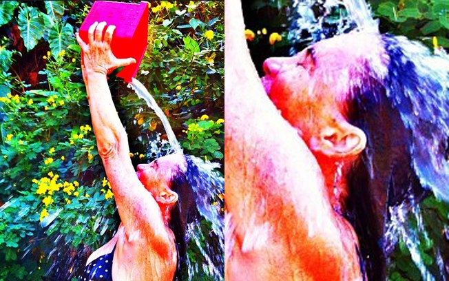 De biquíni, Regina Duarte publica foto tomando banho de balde