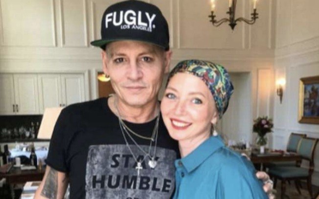 Johnny Depp junto com uma fã